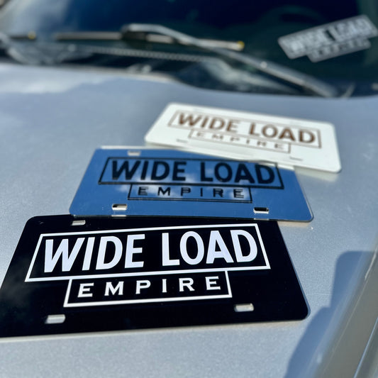 Framed Wide Load Empire License Plate